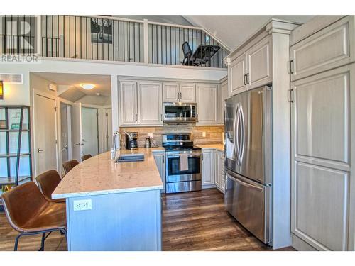 6742 Marbella Loop Unit# 302, Kelowna, BC - Indoor Photo Showing Kitchen With Double Sink