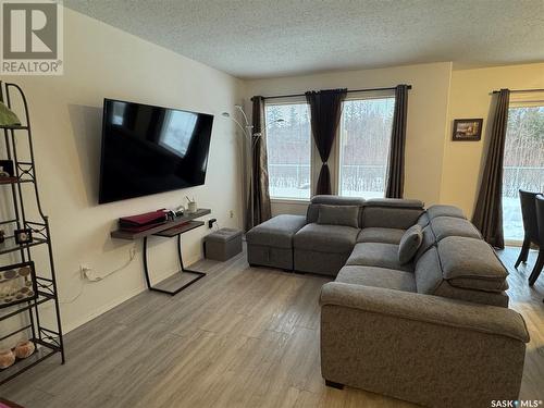 13 1327 Studer Street, La Ronge, SK - Indoor Photo Showing Living Room With Fireplace