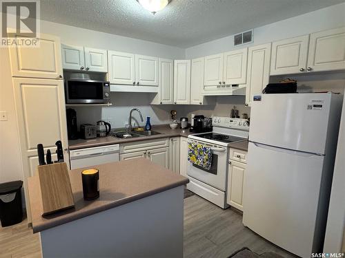 13 1327 Studer Street, La Ronge, SK - Indoor Photo Showing Kitchen With Double Sink