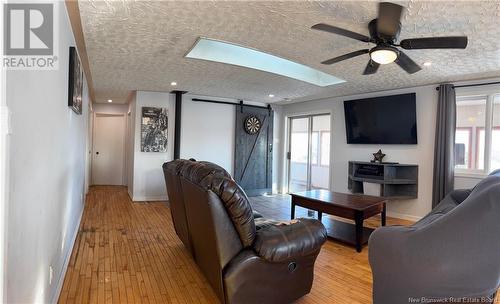 116 Norton Shore Road, Hampton, NB - Indoor Photo Showing Living Room With Fireplace