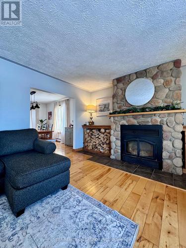 434 Carrigan Road, Timmins (Tm - Outside East), ON - Indoor Photo Showing Living Room With Fireplace