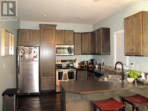 452 Margaret Avenue, Duchess, AB - Indoor Photo Showing Kitchen With Double Sink