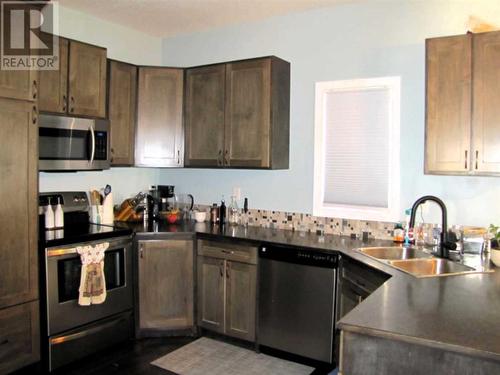 452 Margaret Avenue, Duchess, AB - Indoor Photo Showing Kitchen With Double Sink