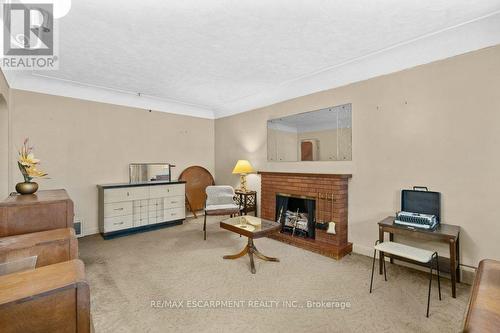 1A Cameron Avenue, Hamilton, ON - Indoor With Fireplace