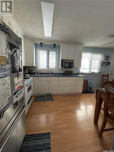 218 King Street, Quinton, SK - Indoor Photo Showing Kitchen With Double Sink