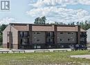 8 511 Studer Street, La Ronge, SK  - Outdoor With Balcony With Facade 