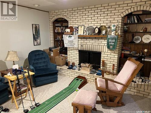 1291 112Th Street, North Battleford, SK - Indoor Photo Showing Other Room With Fireplace