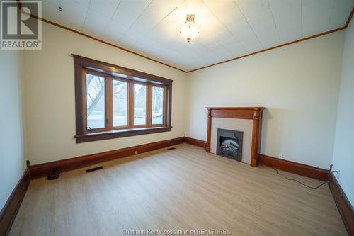 21928 Charing Cross Road, Chatham, ON - Indoor With Fireplace