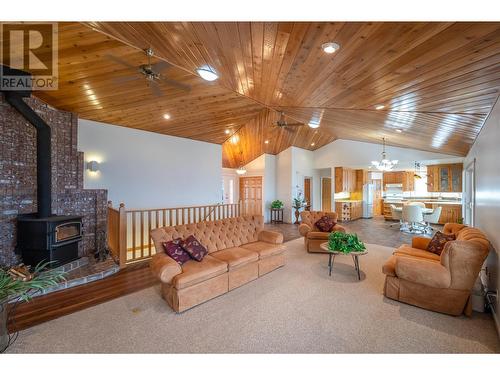 120 Panorama Ridge Road, Penticton, BC - Indoor Photo Showing Living Room With Fireplace