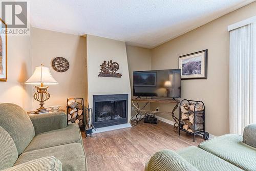 1056 Dowland Crescent, Burlington, ON - Indoor Photo Showing Living Room With Fireplace