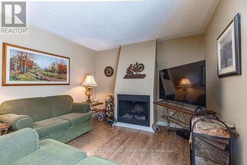 1056 Dowland Crescent, Burlington, ON - Indoor Photo Showing Living Room With Fireplace