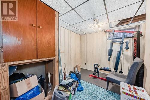 2622 42 Street Se, Calgary, AB - Indoor Photo Showing Gym Room