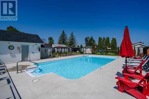 30 - 10 Winfield Drive, Tay (Victoria Harbour), ON - Outdoor With In Ground Pool