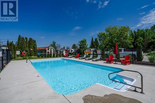 30 - 10 Winfield Drive, Tay (Victoria Harbour), ON - Outdoor With In Ground Pool