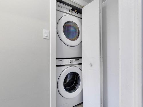 Salle de lavage - 404-959 Av. St-Charles, Laval (Chomedey), QC - Indoor Photo Showing Laundry Room