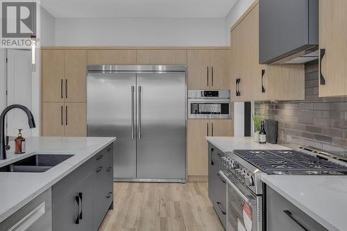 771 Carnoustie Drive, Kelowna, BC - Indoor Photo Showing Kitchen With Double Sink With Upgraded Kitchen