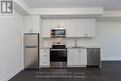 1112 - 3220 William Coltson Avenue, Oakville, ON - Indoor Photo Showing Kitchen With Stainless Steel Kitchen