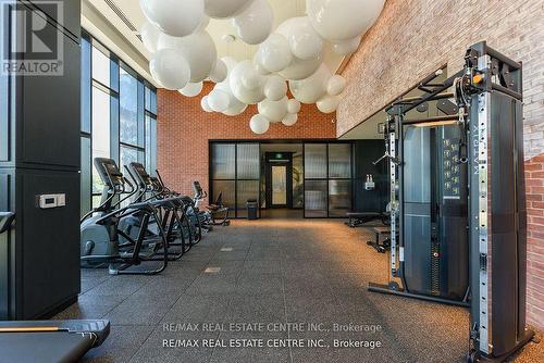 1112 - 3220 William Coltson Avenue, Oakville, ON - Indoor Photo Showing Gym Room