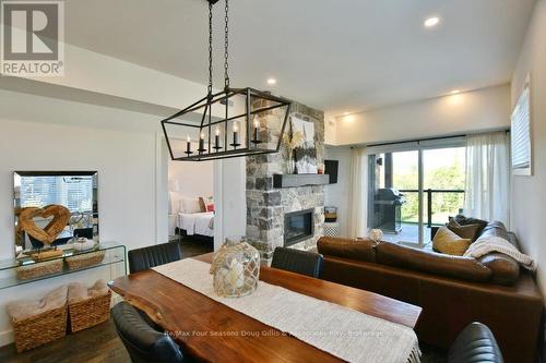 207 - 12 Beausoleil Lane, Blue Mountains (Blue Mountain Resort Area), ON - Indoor With Fireplace