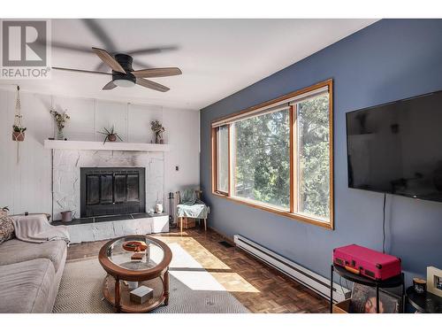 587 Mountain Drive, Vernon, BC - Indoor Photo Showing Living Room With Fireplace