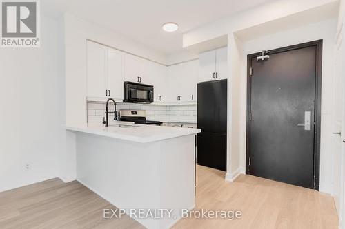 2010 - 70 Absolute Avenue, Mississauga, ON - Indoor Photo Showing Kitchen