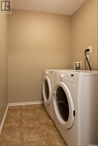 307 2233 St Henry Avenue, Saskatoon, SK - Indoor Photo Showing Laundry Room