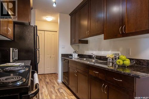 307 2233 St Henry Avenue, Saskatoon, SK - Indoor Photo Showing Kitchen With Double Sink