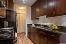 307 2233 St Henry Avenue, Saskatoon, SK  - Indoor Photo Showing Kitchen With Double Sink 