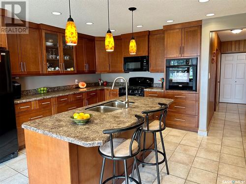 74 Nunn Street, La Ronge, SK - Indoor Photo Showing Kitchen With Double Sink