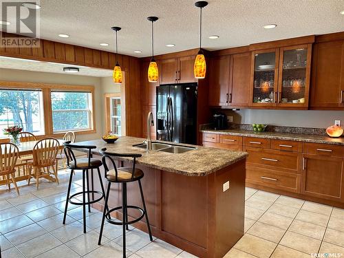 74 Nunn Street, La Ronge, SK - Indoor Photo Showing Kitchen With Double Sink