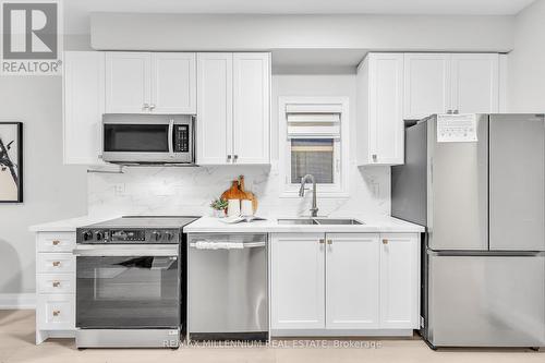 18 Deneb Street, Barrie, ON - Indoor Photo Showing Kitchen With Double Sink