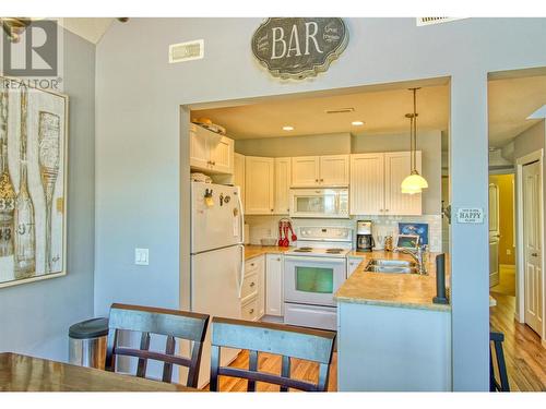 6804 Santiago Loop N Unit# 157, Kelowna, BC - Indoor Photo Showing Kitchen With Double Sink