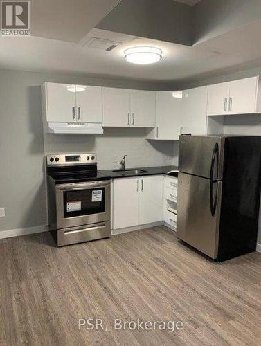 1 - 205 Gerrard Street E, Toronto, ON - Indoor Photo Showing Kitchen With Stainless Steel Kitchen