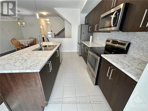 588 Lilith Street, Ottawa, ON - Indoor Photo Showing Kitchen With Double Sink With Upgraded Kitchen