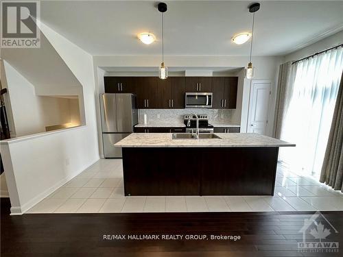 588 Lilith Street, Ottawa, ON - Indoor Photo Showing Kitchen With Double Sink With Upgraded Kitchen