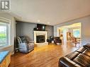 1551 View Drive, Quesnel, BC  - Indoor Photo Showing Living Room With Fireplace 