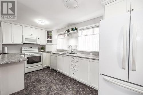 58 Laidlaw Drive, Barrie, ON - Indoor Photo Showing Kitchen With Double Sink