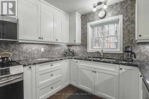 60 Concession 4 E, Tiny, ON - Indoor Photo Showing Kitchen With Double Sink With Upgraded Kitchen