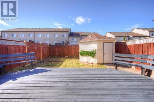 Wooden terrace with a storage shed - 83 Bridlewreath Street, Kitchener, ON - Outdoor With Exterior