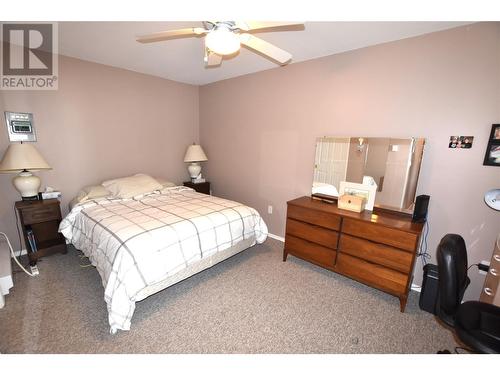 primary bedroom - 10983 Westside Road, Vernon, BC - Indoor Photo Showing Bedroom