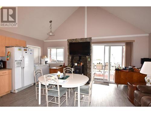 vaulted ceilings - 10983 Westside Road, Vernon, BC - Indoor Photo Showing Dining Room