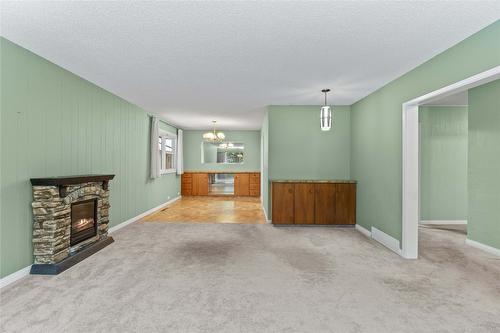 1115 Victoria Road, Revelstoke, BC - Indoor With Fireplace