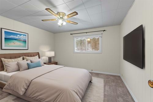 1115 Victoria Road, Revelstoke, BC - Indoor Photo Showing Bedroom