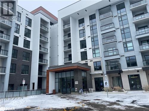 View of snow covered building - 490 Gordon Krantz Avenue Unit# 602, Milton, ON - Outdoor With Facade