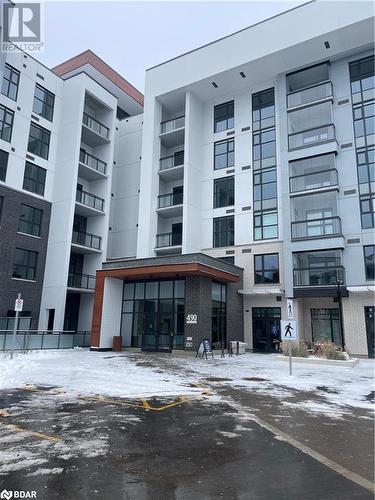 View of snow covered property - 490 Gordon Krantz Avenue Unit# 602, Milton, ON - Outdoor With Facade