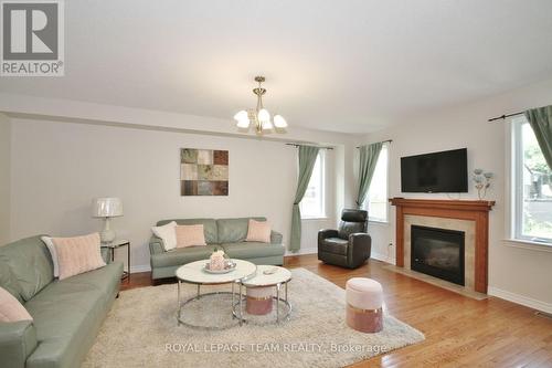 120 Bandelier Way, Ottawa, ON - Indoor Photo Showing Living Room With Fireplace