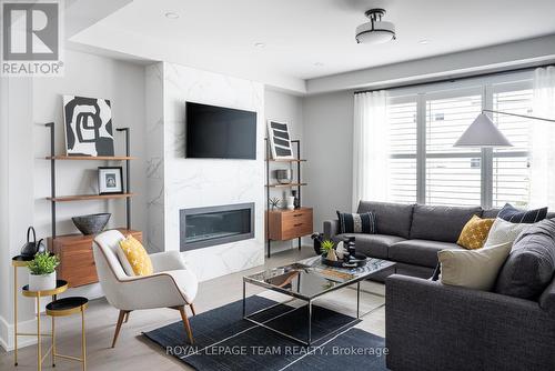 208 Douglas Hardie Street, North Grenville, ON - Indoor Photo Showing Living Room With Fireplace