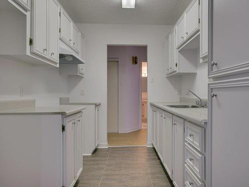 Cuisine - 562-345 Boul. Jean-Baptiste-Rolland E., Saint-Jérôme, QC - Indoor Photo Showing Kitchen