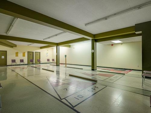 Salle de jeux - 562-345 Boul. Jean-Baptiste-Rolland E., Saint-Jérôme, QC - Indoor Photo Showing Other Room