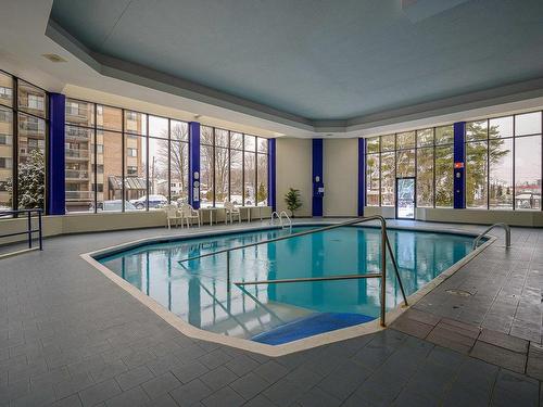 Piscine - 562-345 Boul. Jean-Baptiste-Rolland E., Saint-Jérôme, QC - Indoor Photo Showing Other Room With In Ground Pool